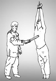 ...to a Chinese military officer brutalizing a prisoner with a "beating stick"