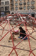 One of the playgrounds has an open geodesic dome